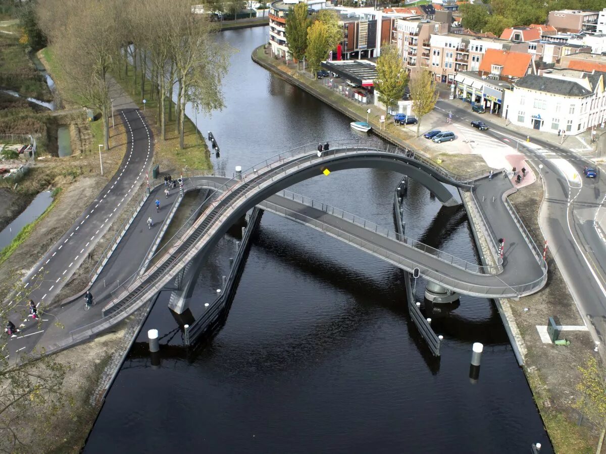 Самый мост в европе. Melkwegbridge – необычный прогулочный мост в нидерландах. акведук велувемеер нидерланды. голландия акведук мост. водный мост veluwemeer, нидерланды.