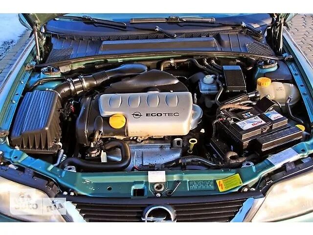 Двигатель 1.8 вектра б. Двигатель на Opel Vectra b 1 8 x18xe. 1,8 Мотор на опеле Вектра. Опель Вектра б 1.8 мотор. Opel Vectra 1999 1.8 мотор.