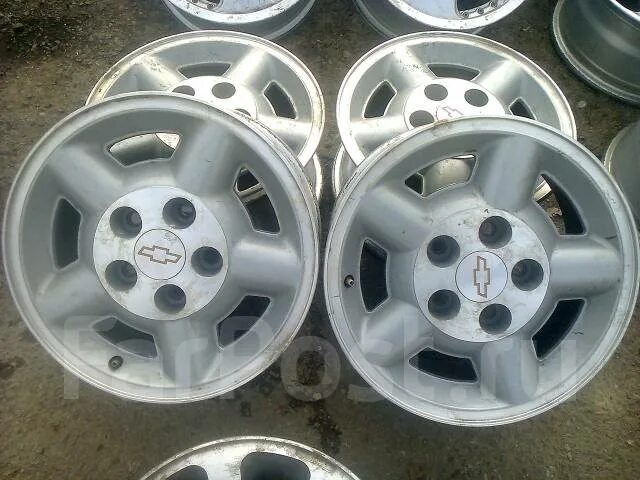 Диски gm r15. Диск шевроле r15. Литые диски нива шевроле 15r штатные. Литой диск r15 нива шевроле. Диски лачетти r15.