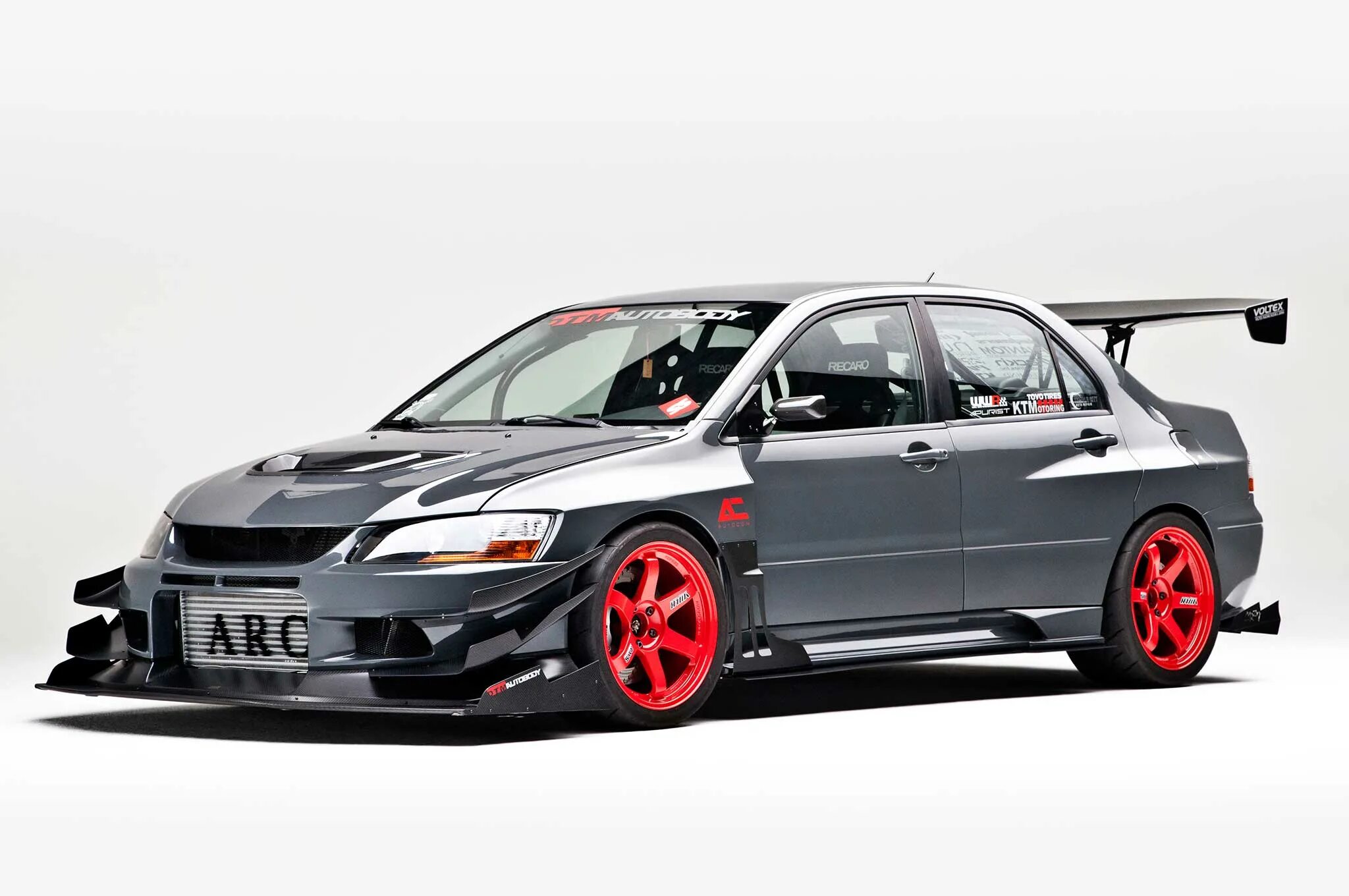 Эво под. Мицубиси ланцер Эво 9. Лансер 9 Эволюшн. Mitsubishi Lancer EVO 6. Мицубиси Лансер 9 еволютион.