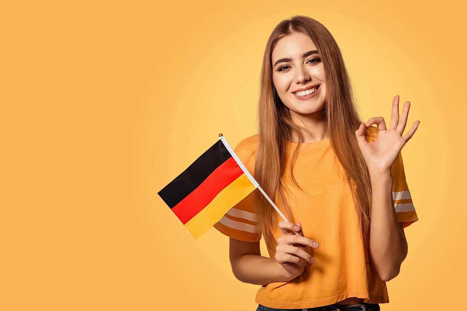 Девушка с немецким флагом. Изучение немецкого языка. Люди с флагом Германии. Студенты с флагами. Языке post