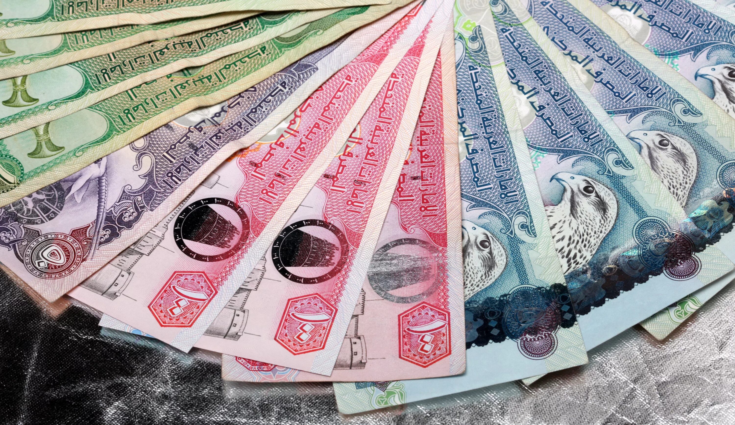 Менять доллары на дирхамы. Валюта Объединенных арабских Эмиратов. Купюры дирхамы ОАЭ. Национальная валюта ОАЭ. Дирхам — валюта Объединенных арабских Эмиратов.