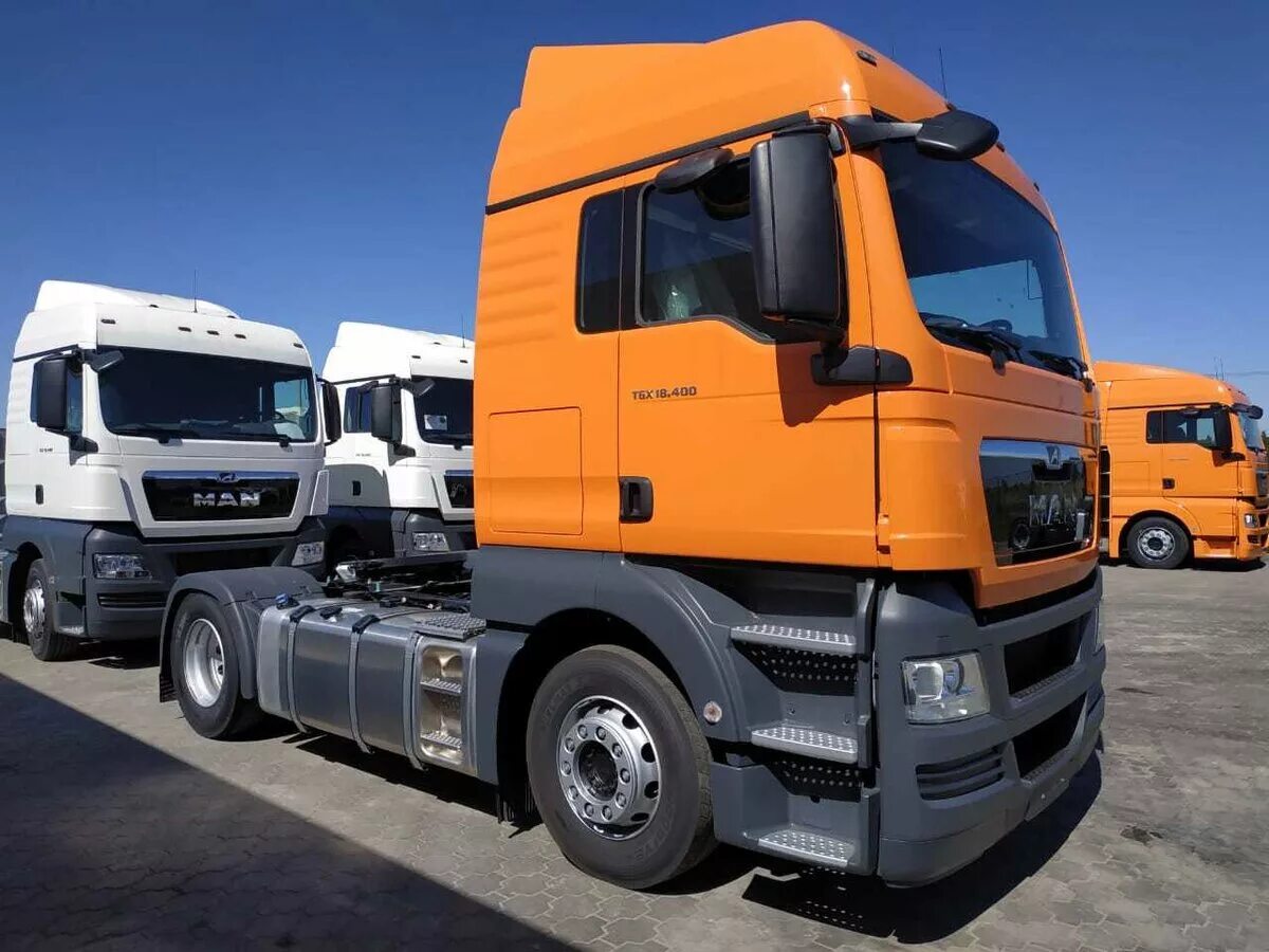 Ман TGX 2018 тягач. Man TGX 18400. Man TGX 18400, 2008. Ман ТГХ оранжевый. Ман 2017 года