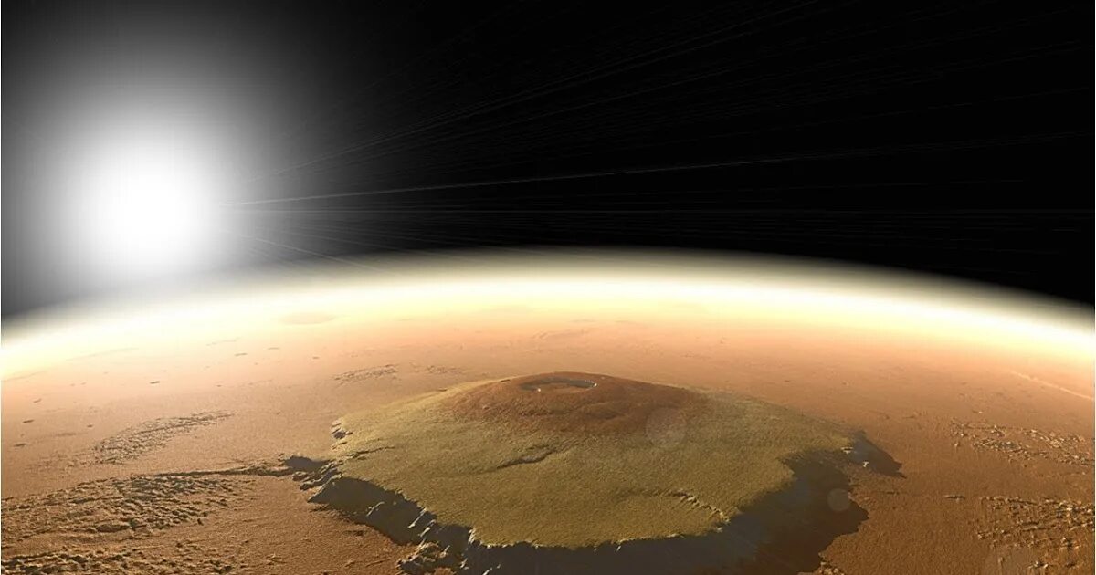Самая высокая гора в солнечной системе находится. Гора Олимп на Марсе. Марсианский вулкан Олимп. Марс Планета гора Олимп. Гора Олимп на Марсе фото.