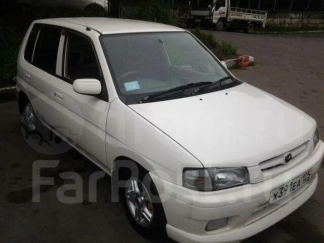 Mazda Demio 1999. Mazda Demio 1999 1 поколение. Коса Мазда Демио 1999. Mazda Demio 1999 тюнинг 1 поколение.