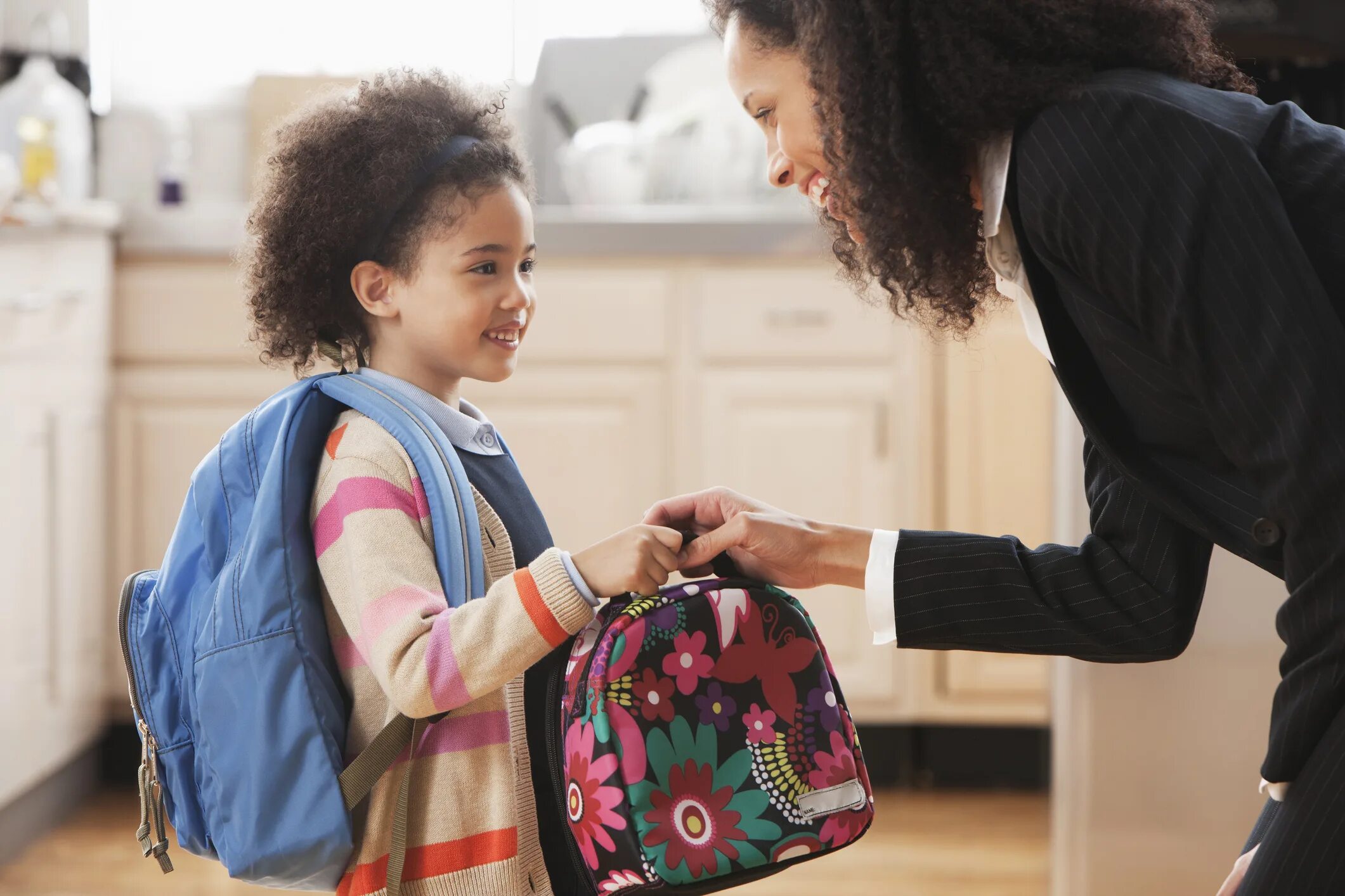 She has gone to school. Lunch Kids. Kids and lunch Bag. Children's School lunch. Children with Bag back.