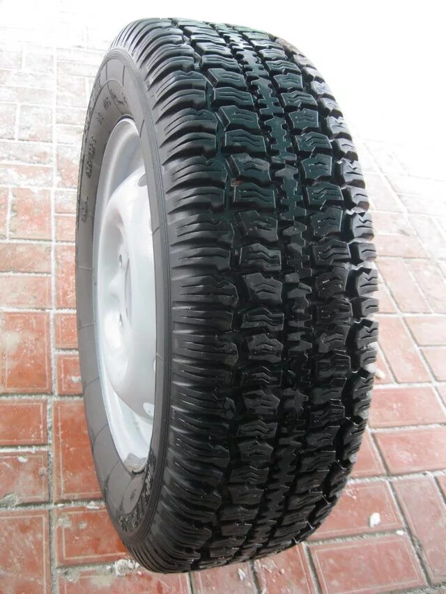 Колеса флейм. Шины Кама Флейм 205/70 r16. Кама Флейм 205/70/16 на ниву. 205 70 16 Кама Flame. Кама Флейм 205/70/16 всесезонная на ниву.