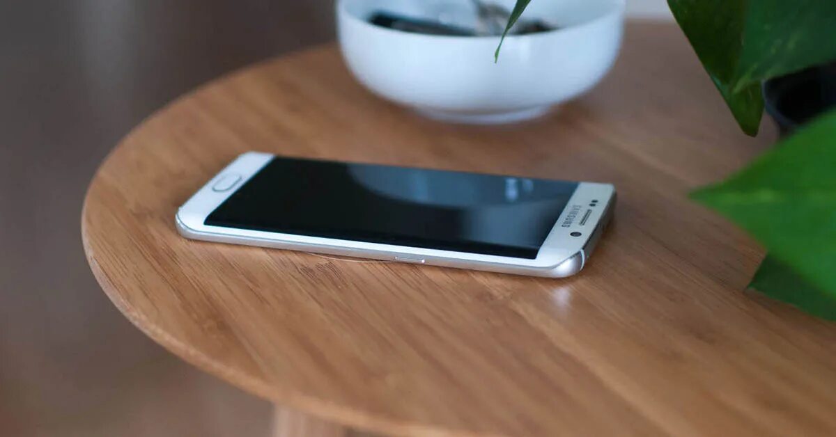 The phone is the table. Phone on table. smartphone on the table. the best phones &quot;table&quot;. phone on the table picture.