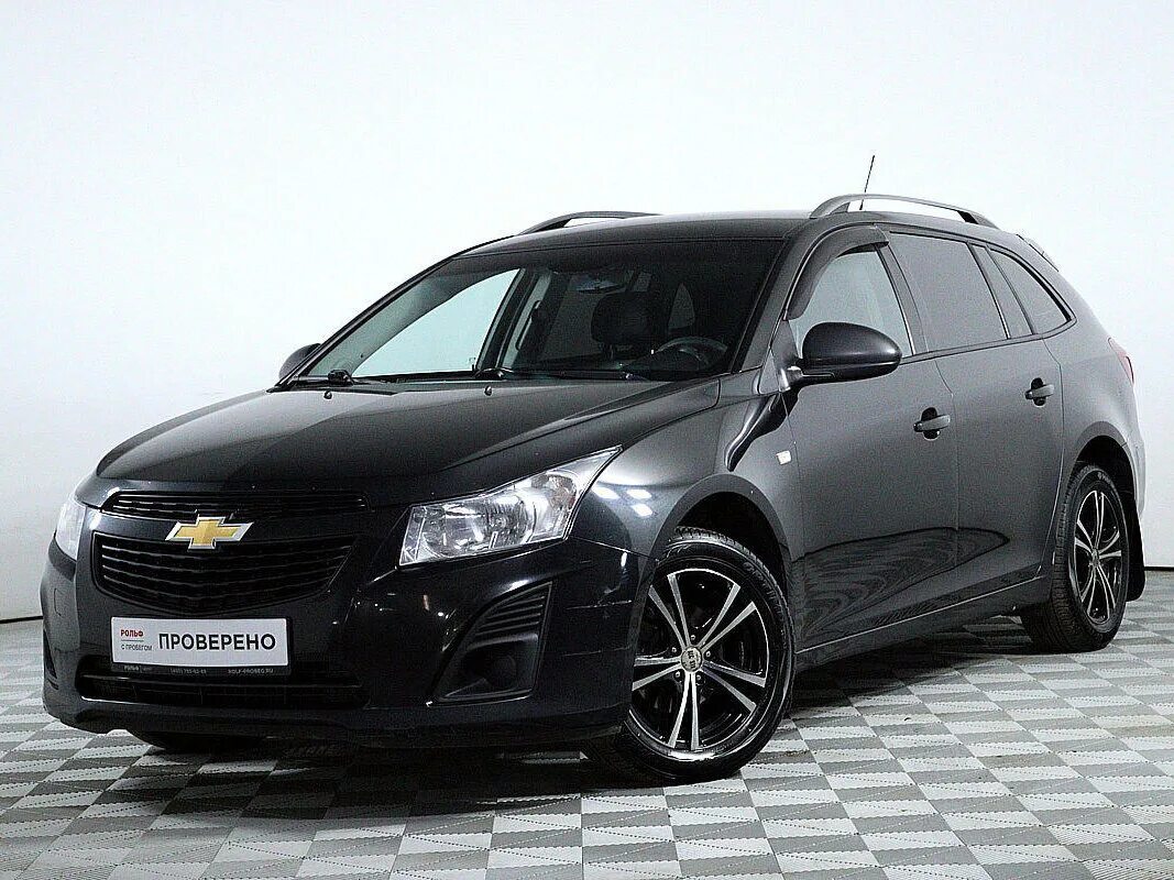 Chevrolet Cruze 1 Рестайлинг универсал. Шевроле Круз универсал черный. Шевроле Круз универсал черный фото. Шевроле Круз универсал отзывы по грунтовым дорогам. Круз универсал 1.8