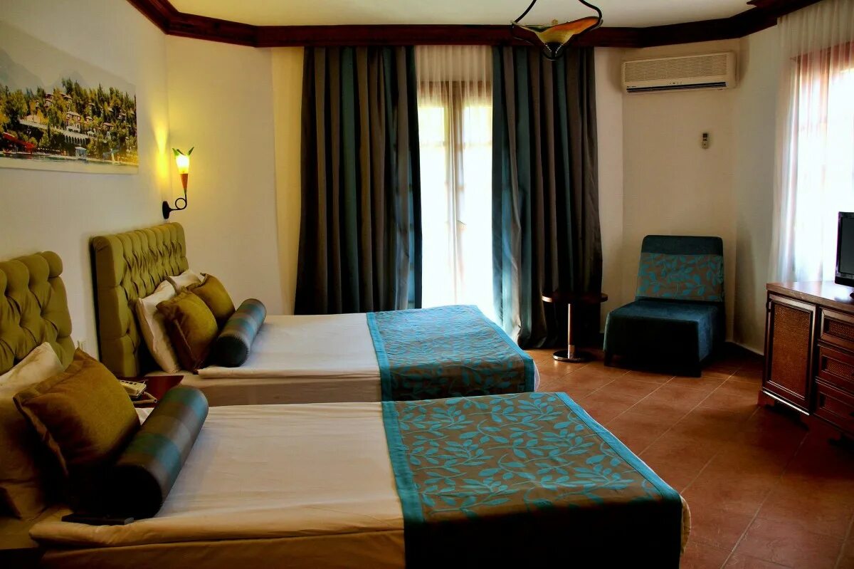 Letoonia golf resort. Letoonia golf resort 5. байар фэмили резорт. selectum family resort номера.