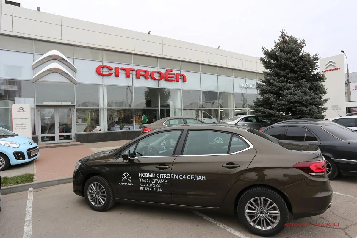 Дилерский центр ситроен. Citroën краснодар. Пежо моторс. Citroen краснодар. Автосалон mitsubishi.