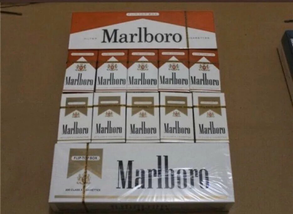 Производство мальборо. Сигареты мальборо классические. Пачка marlboro. Сигареты ротманс в 90 годах. Сигареты мальборо из швейцарии.