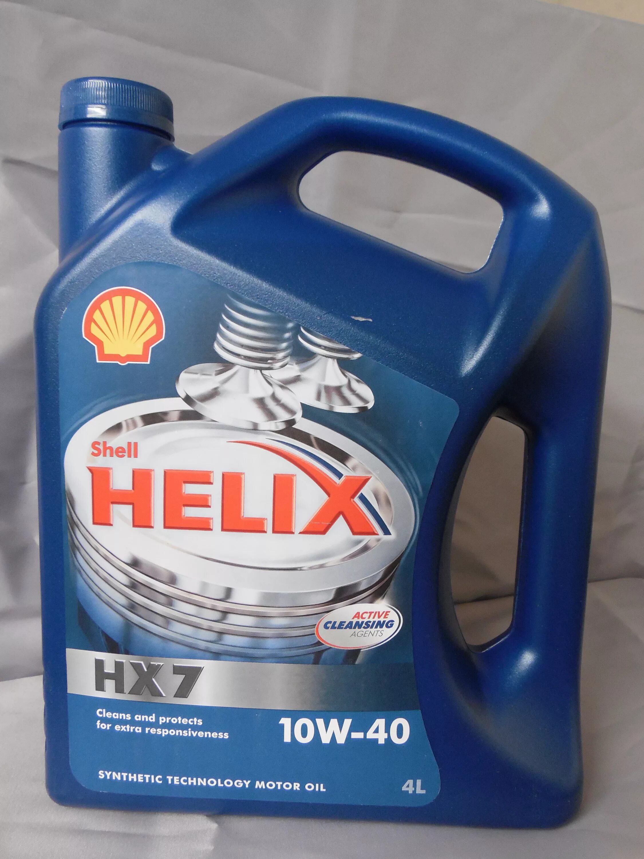 Shell helix 10w. Шелл хеликс 10w 40 полусинтетика. shel hx7 10w40. шелл хеликс супер 10w. масло шелл хеликс 10w 40 полусинтетика.