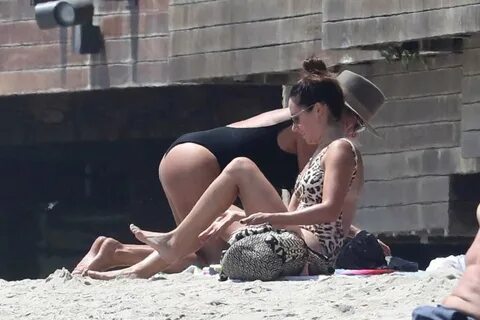Ashley Tisdale in Swimsuit on the beach in Malibu. 
