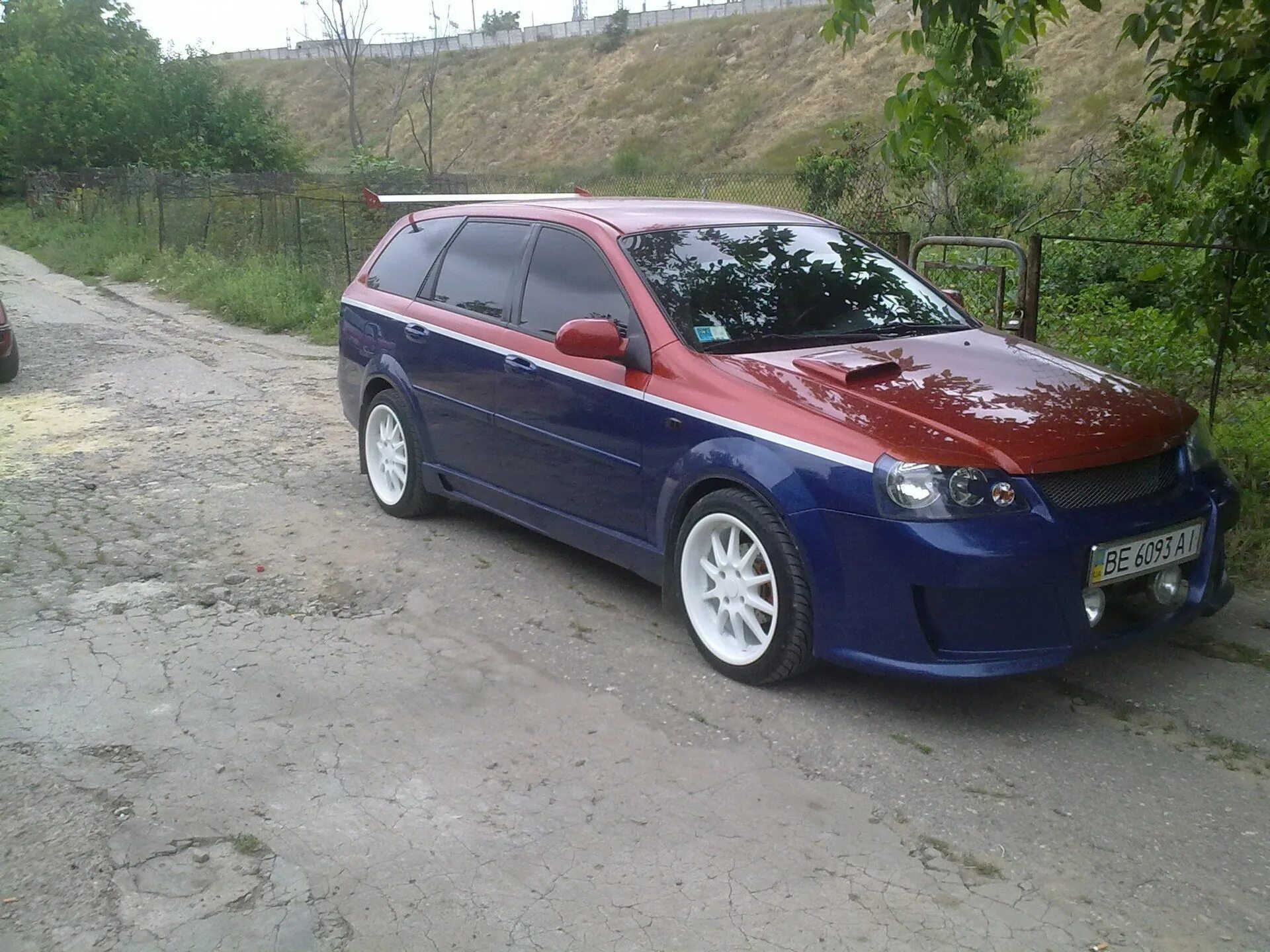 Тюнинг лачетти универсал. Chevrolet Lacetti SW. Chevrolet Lacetti Wagon Tuning. Тюнингованная Лачетти универсал. Chevrolet Lacetti универсал обвес.