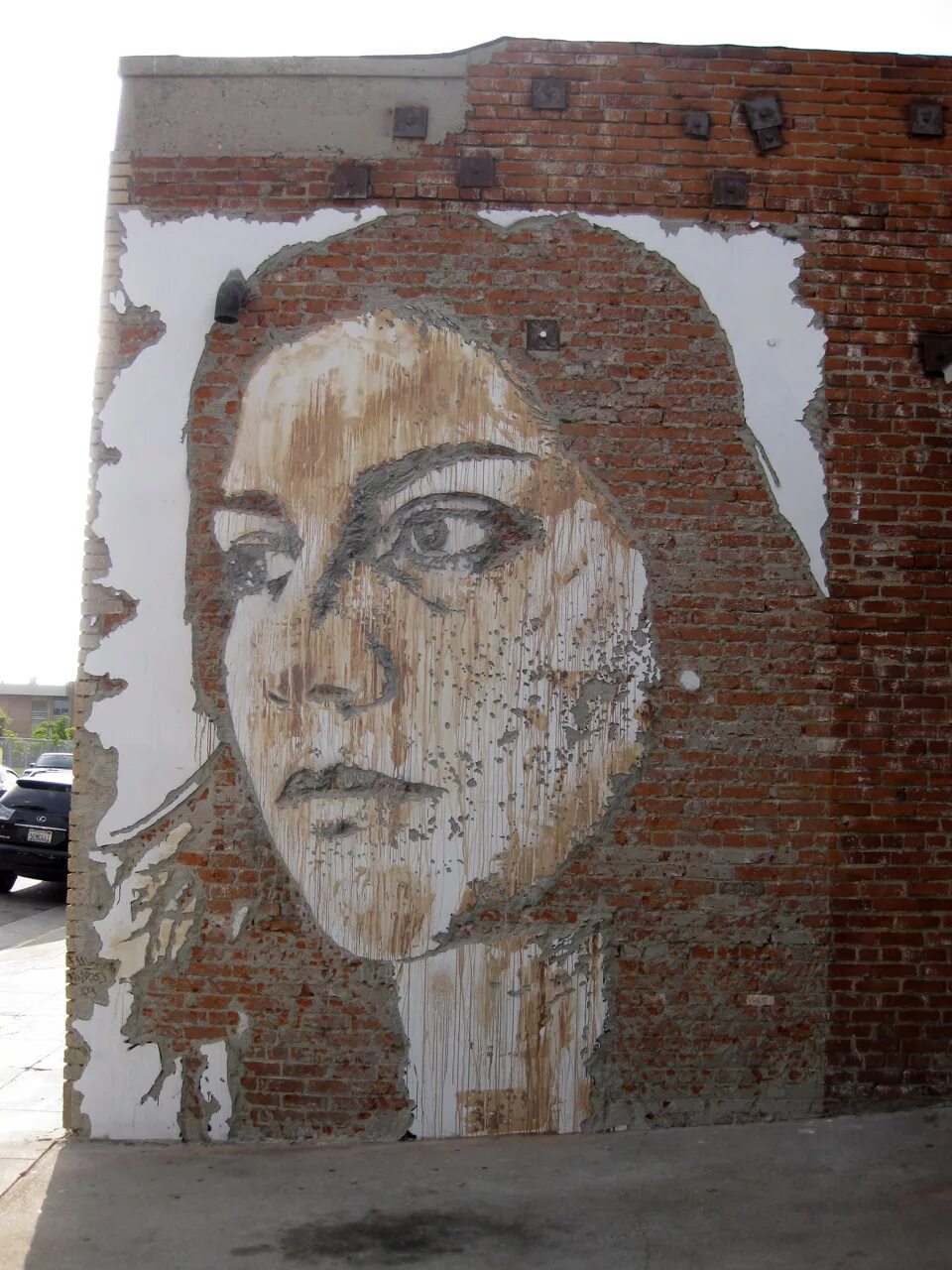 Jorge rodriguez-gerada. Vhils стрит арт. Екатерины будановой граффити. Мурал бэнкси. Портрет на стене дома.