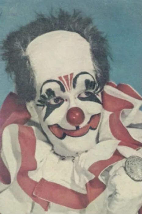 A clown works at a circus