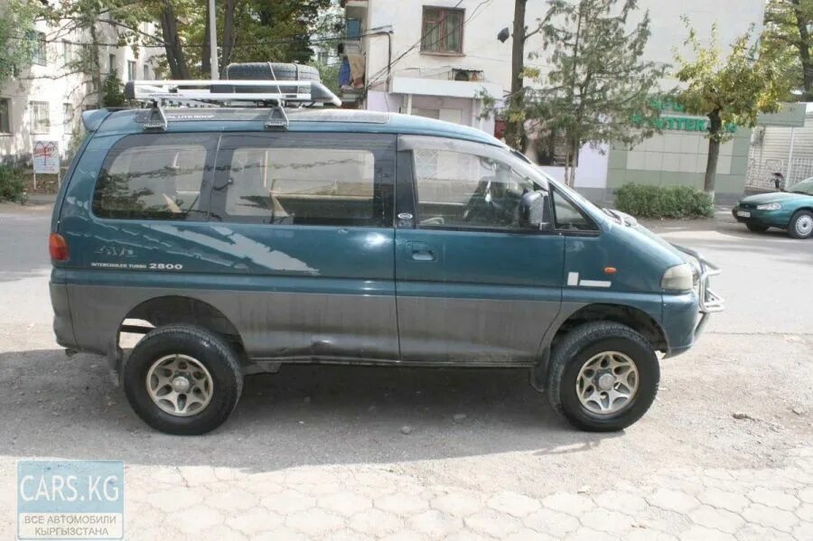 Мицубиси Delica 1994. Мицубиси Делика с левым рулем. Митсубиси Делика 4х4 левый руль. Delica l400 левый руль.