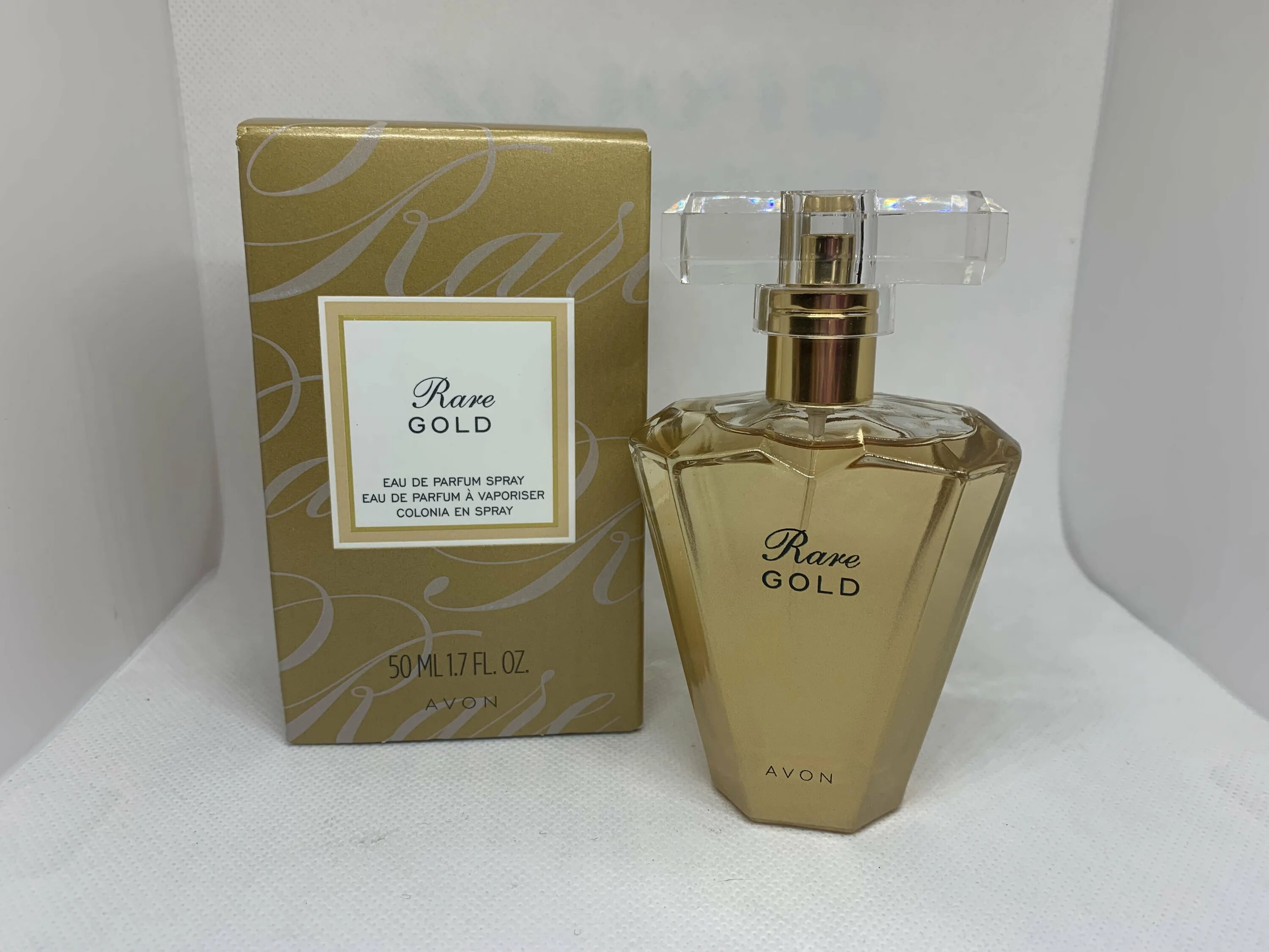 Rare gold. Rare Gold эйвон. Эйвон Голд духи. Шкалад avbon Gold. George Gold Avon.