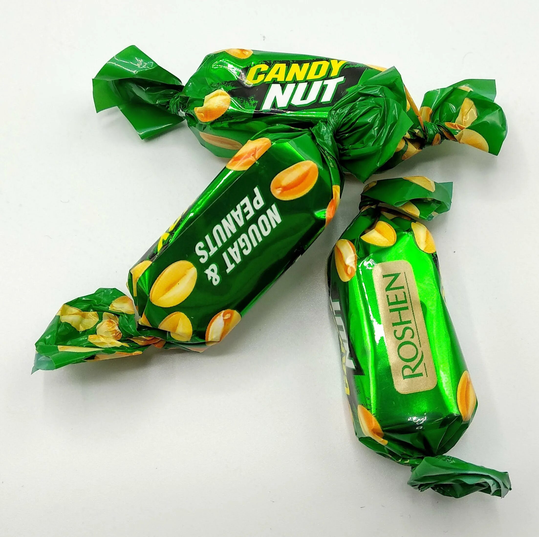 Конфеты полет. Конфеты рошен кэнди нат. рошен candy nut. конфеты рошен candy nut. рошен конфеты кегди нут.