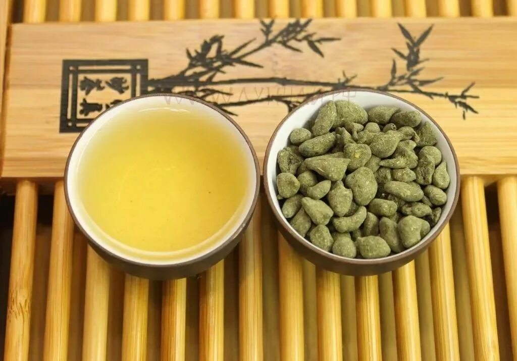 Китайские чаи польза и вред. Женьшеневый улун это китайский чай. Чай - улун женьшень. Китайский чай женьшень улун. Чай китайский зеленый женьшень улун.