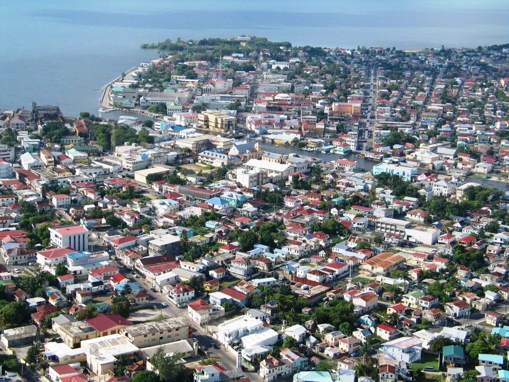 Белиз сити белиз. Климат белиза. Бельмопан белиз фото. Остров белиз. Ambergris caye карибское море.