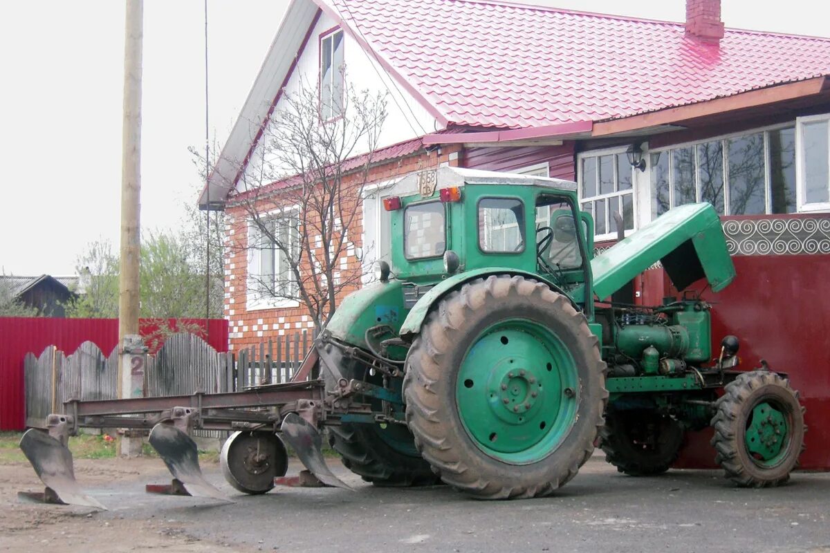 Краснодарский край т 40. Т-40 (трактор). Трактор т 40 зеленый. Трактор ЛТЗ Т-40ам. Коммунальный трактор т 40.
