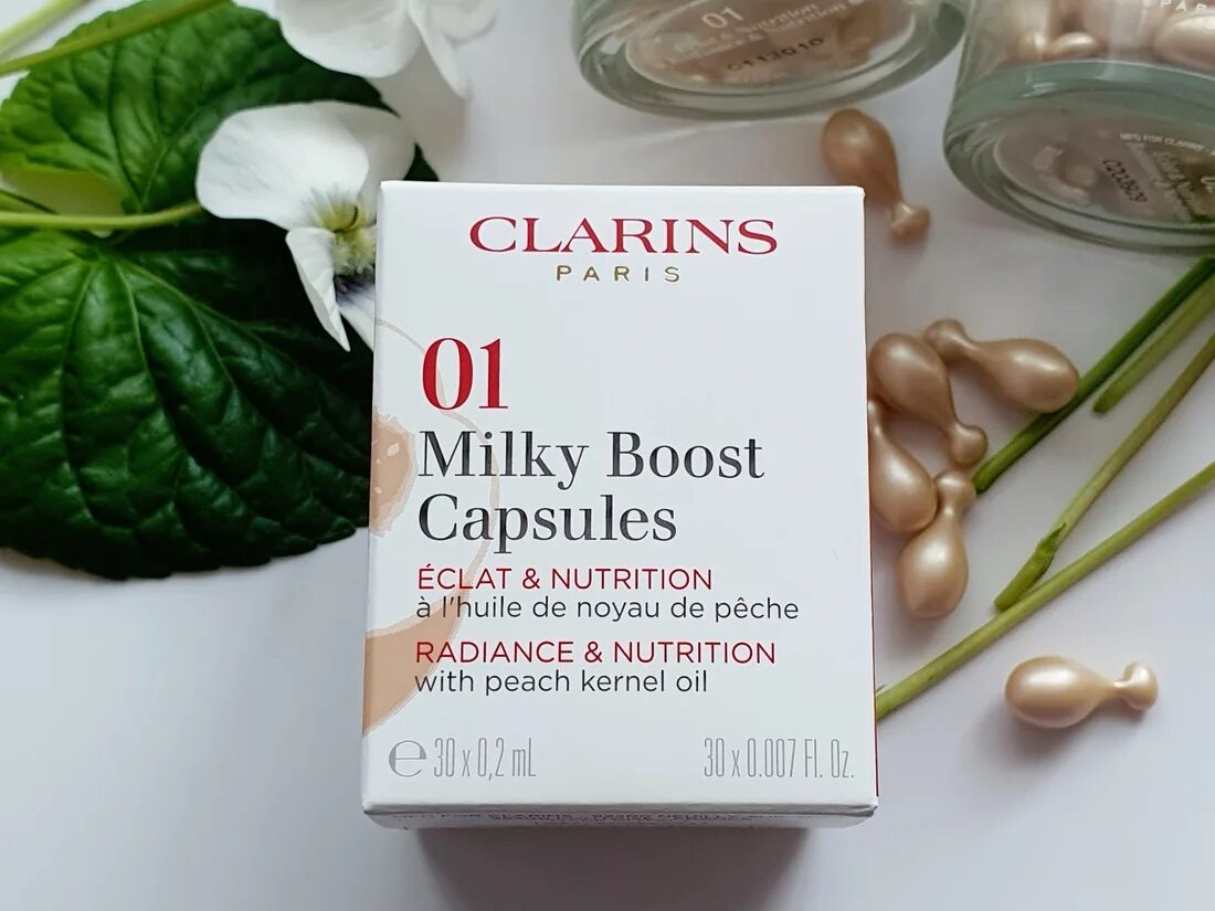 Clarins milky boost 02. Тональный кларинс милки бост 04. Оттеночный флюид milky boost пробник. Clarins milky boost оттенки. Milky boost capsules.