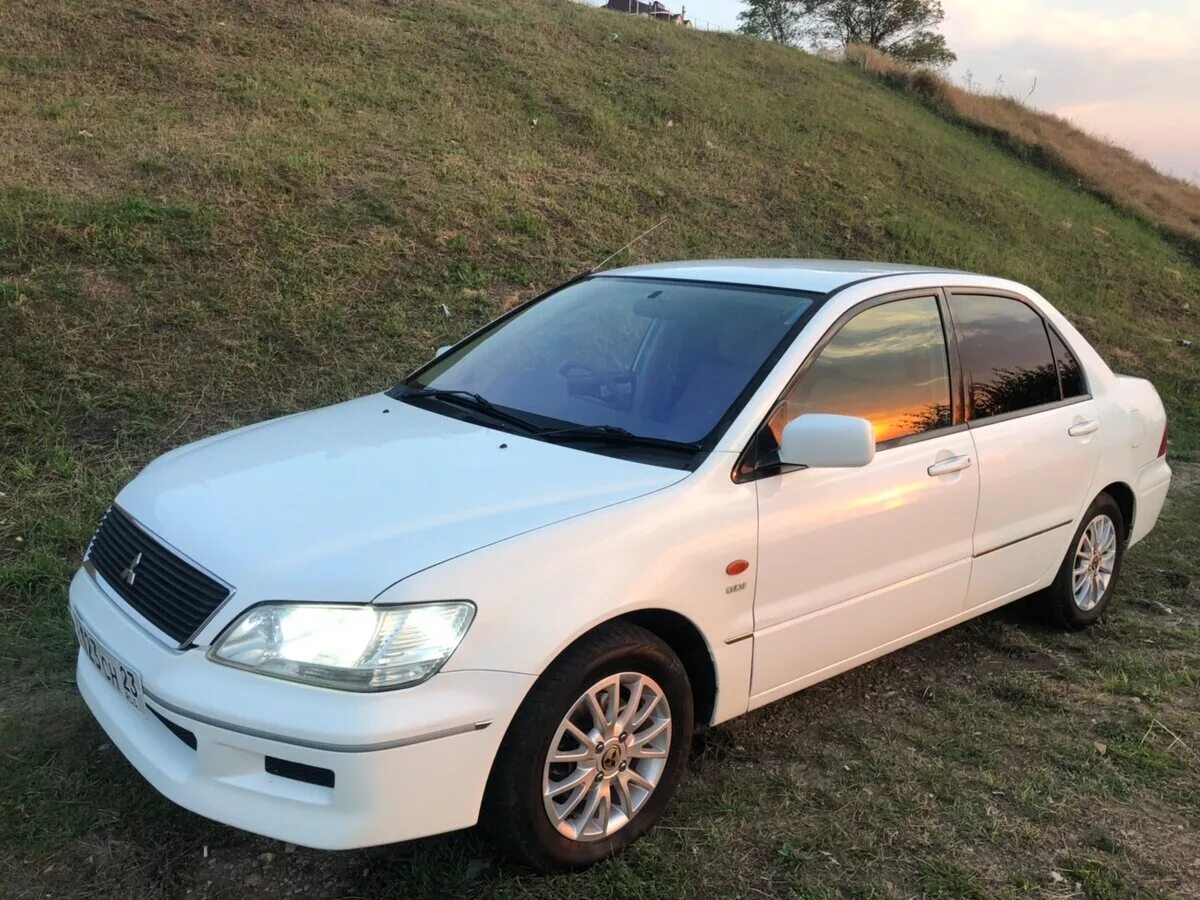 Митсубиси лансер цедия купить. Митсубиси Лансер цедия. Mitsubishi Lancer Cedia 2001 1.5. Mitsubishi Lancer 2001. Мицубиси Лансер Cedia 2001.