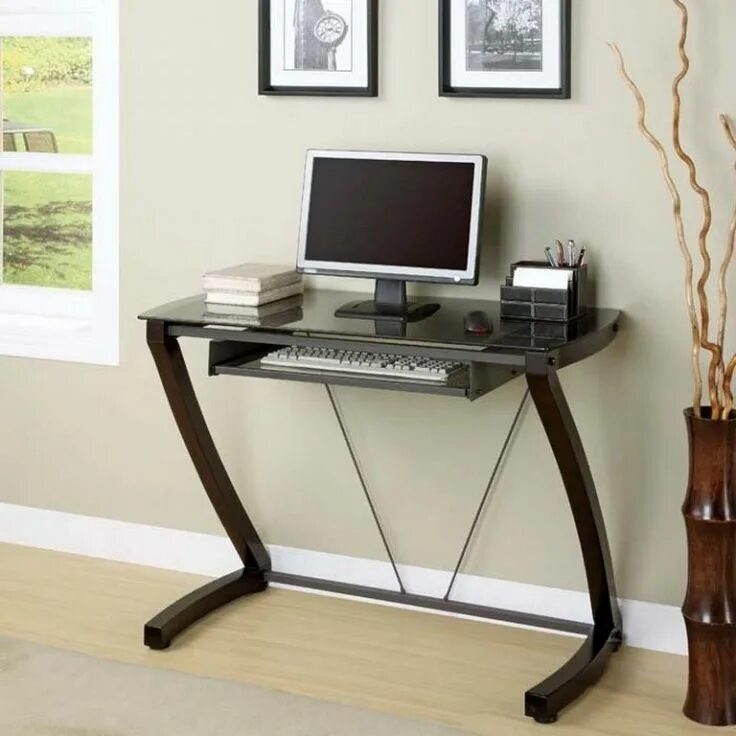 The computer is the desk