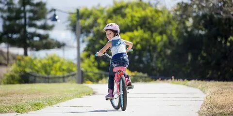 He s riding a bike