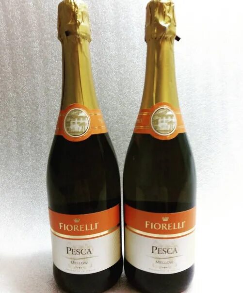 Персиковое вино fragolino. Шампанское с персиковым вкусом. Персиковое вино. Персиковый беллини. Персиковый беллини.