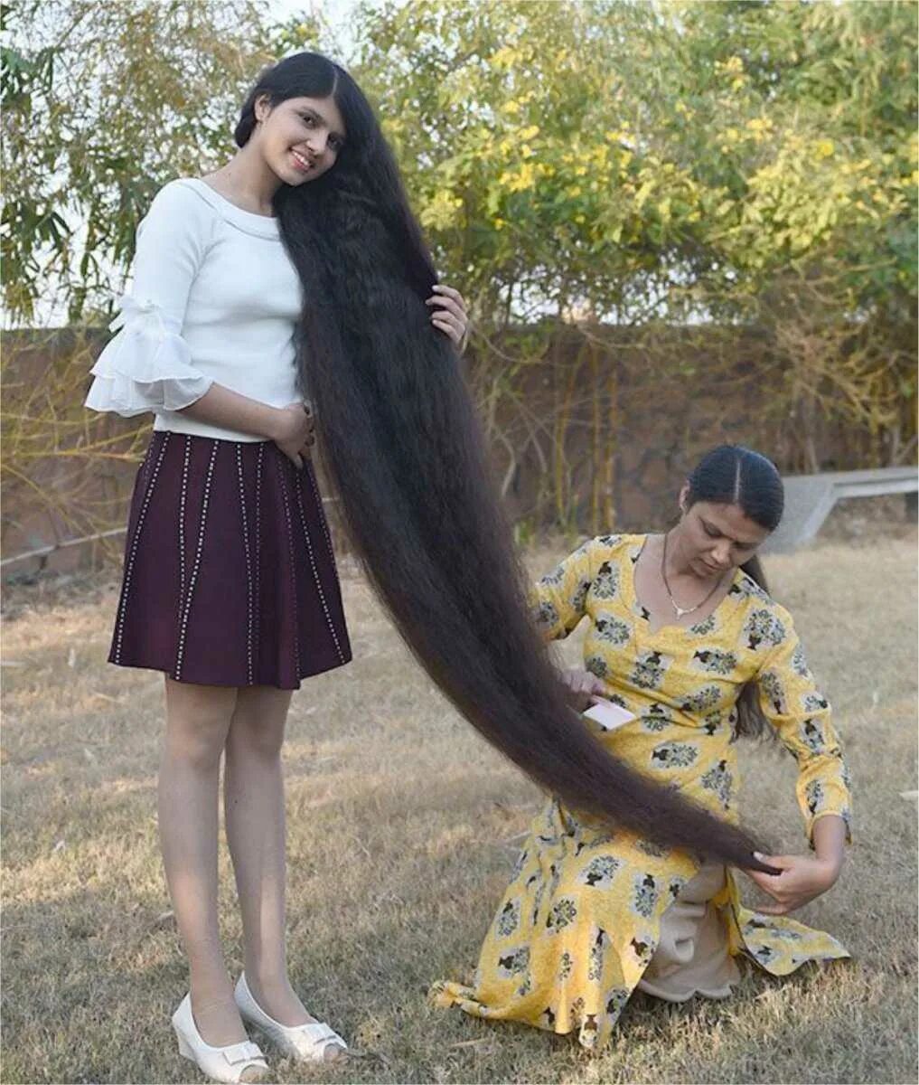 Ниланши Патель. Длинные волосы рекорд Гиннесса. Рекорд Гиннесса самые длинные волосы. Книга рекордов Гиннесса самые длинные волосы.