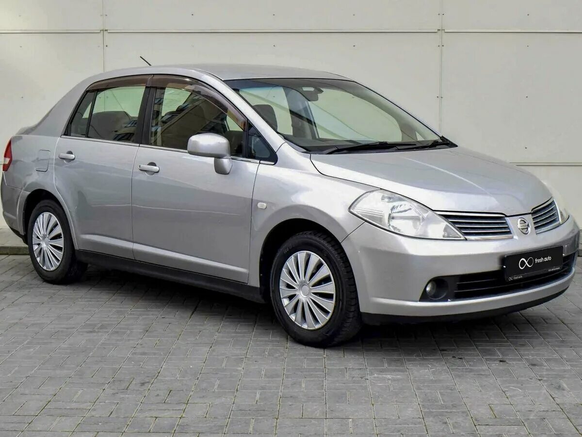 ниссан тиида седан 2005. ниссан тиида латио 2005. ниссан тиида золотая 2005. ниссан тиида 2005 года. Nissan tiida latio 2005.