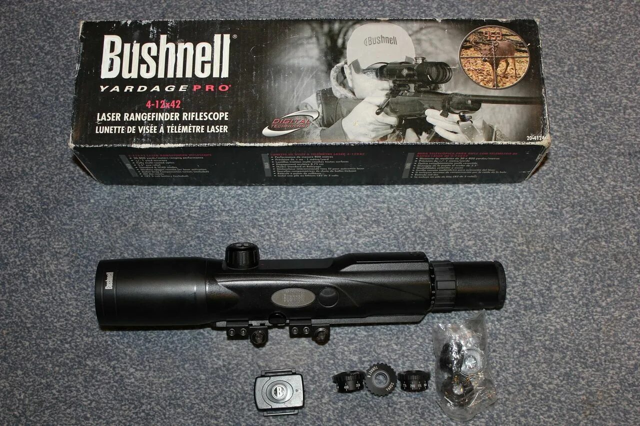 X 12 42 8. Bushnell Yardage Pro 4-12x42. Прицел Bushnell 4 х 12 х42 с дальномером. Прицел Bushnell Yardage Pro. Прицел дальномер Bushnell Yardage Pro 4-12x42.