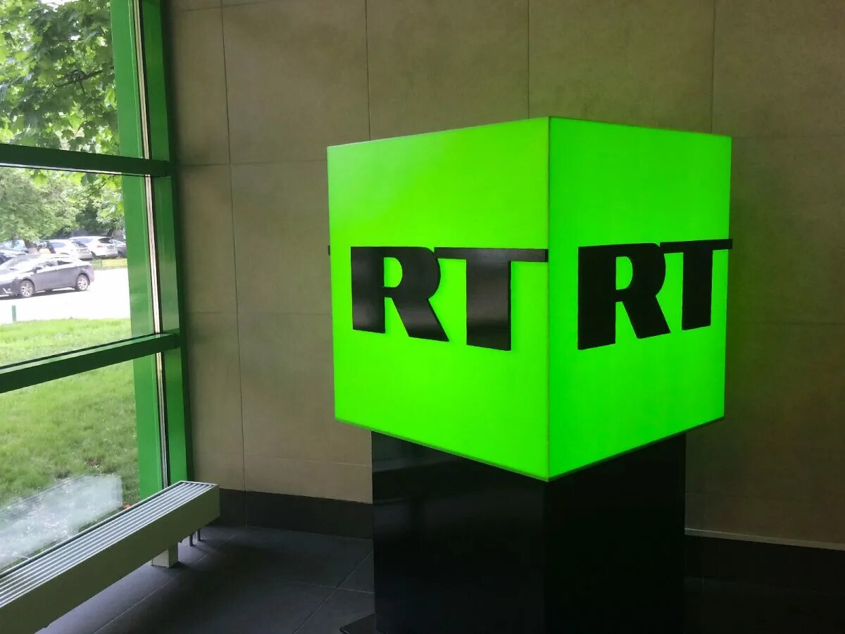 7 ньюс. Russia today офис. RT канал зеленый. The News. RT логотип.