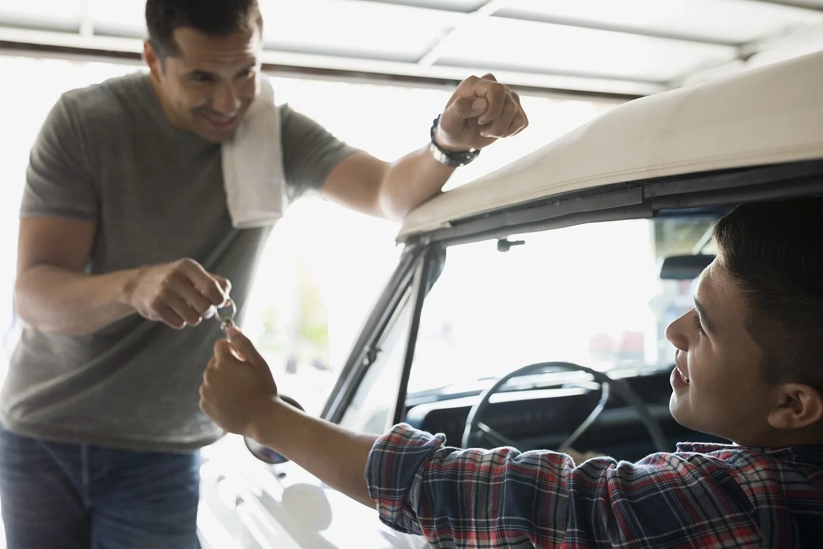 Fixes his car. Borrow car. Your father a car. Father and son Driving a car. Father Fixes a car.