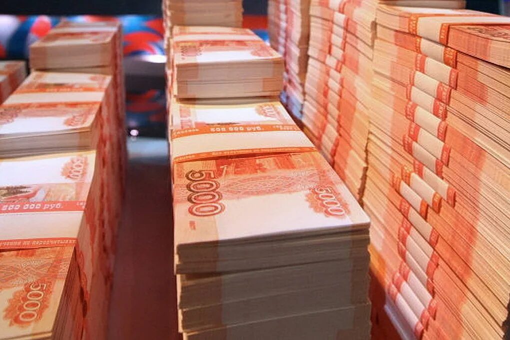 1000 млн рублей. Миллиард рублей. пачка денег. большие деньги пачками. много рублей.