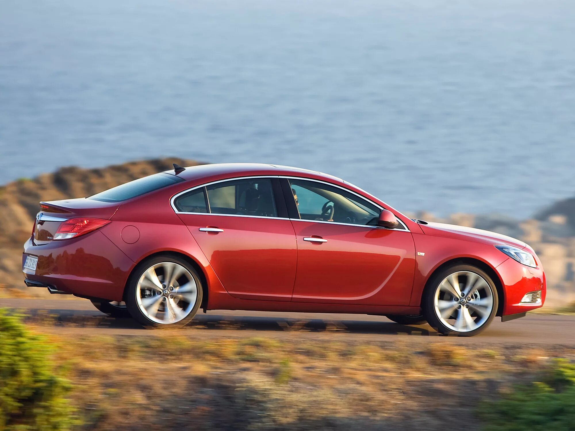 Opel insignia 1.8. Опель Инсигния седан. Опель Инсигния 2008-2013. Опель Инсигния 1 поколение. Opel Insignia 2012.