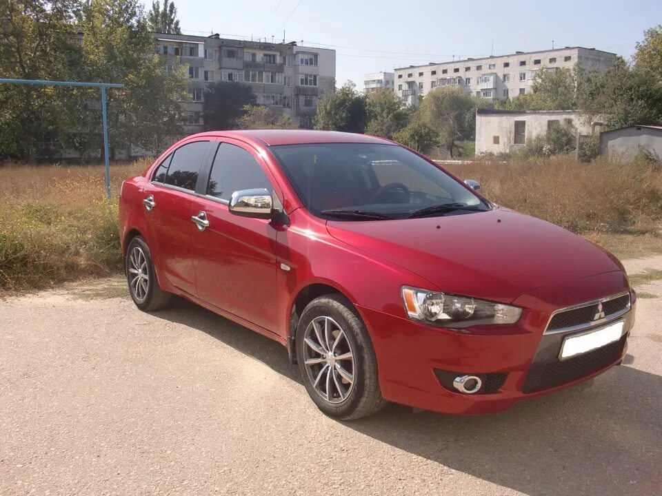 Mitsubishi lancer авито. Митсубиси 10 красная. Митсубиси Лансер 10 красный. Митсубиси Лансер 10 1.5 автомат. Митсубиси Лансер 10 цвета.