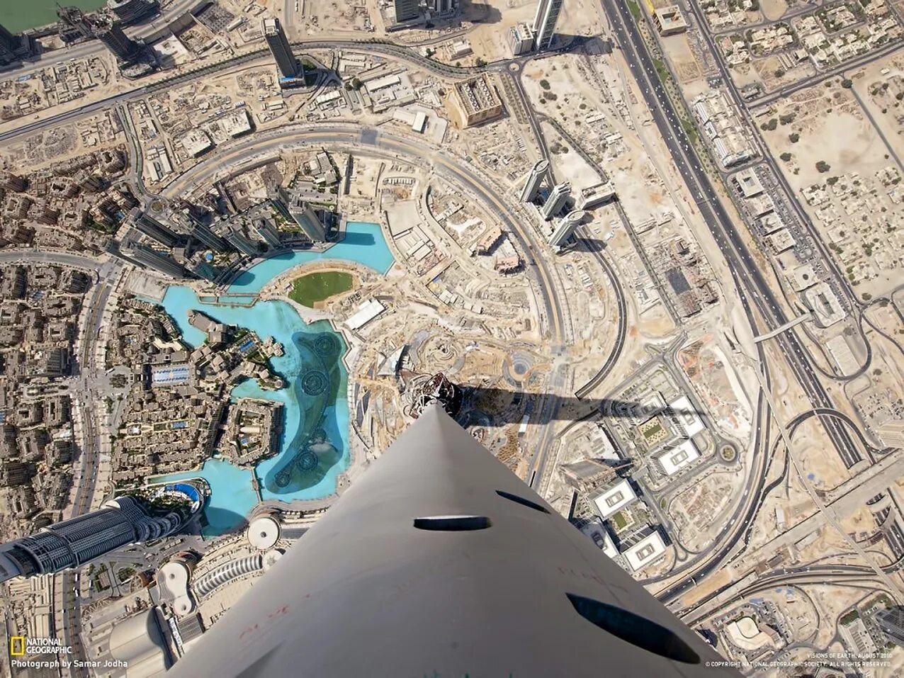Самый большой округ в мире. ОАЭ Дубай Бурдж-Халифа. Абу Даби Бурдж Халифа. Башня в ОАЭ Бурдж Халифа. Бурдж Халифа – 828 метров.