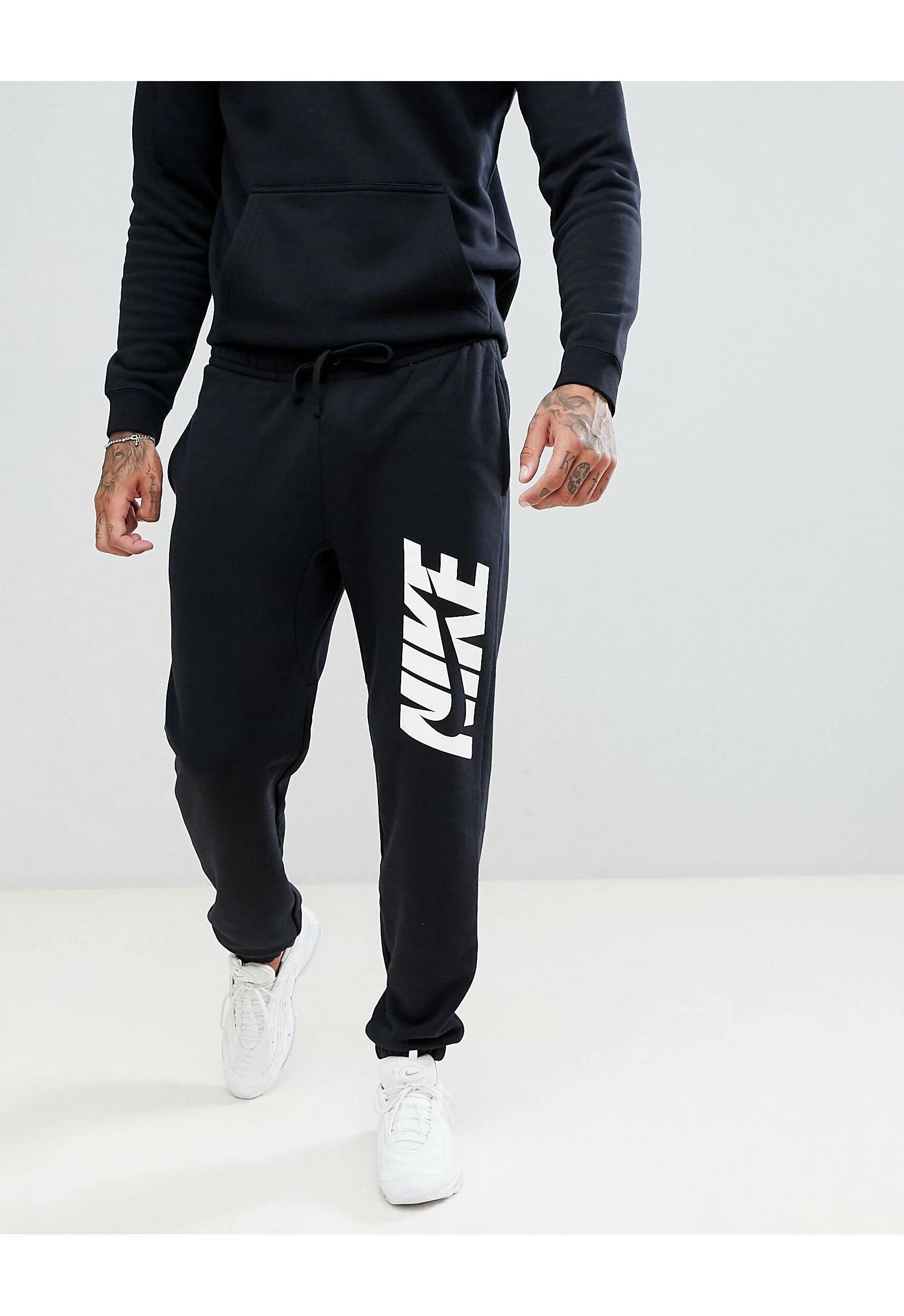 Костюмы с надписями мужские. Спортивный костюм Nike NSW Trk Suit FLC GX JDI. Спортивный костюм Nike Tracksuit. Найк костюм мужской 2021. Nike найк мужской спортивный костюм bv3025.