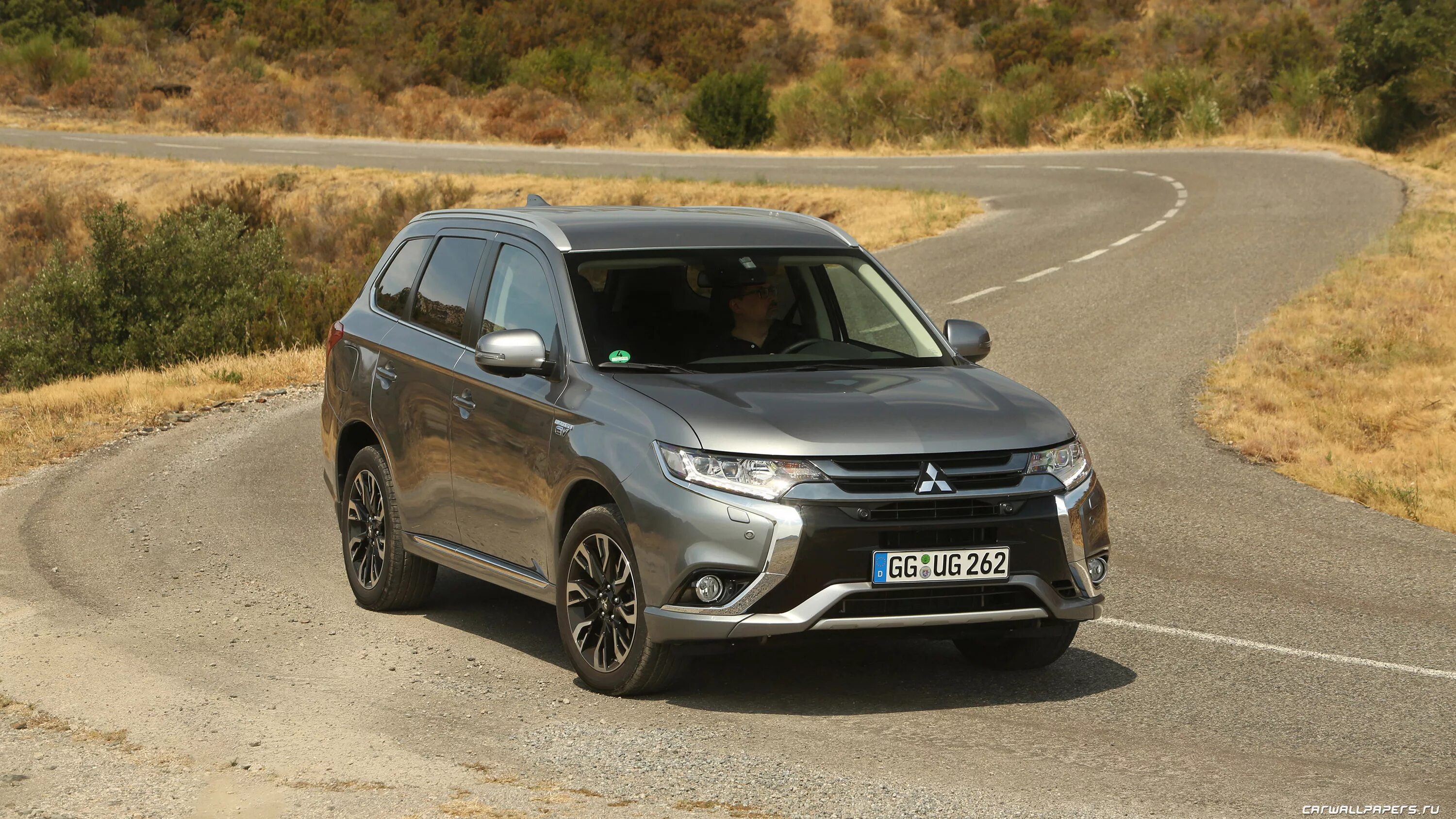 Mitsubishi outlander 4wd. Митсубиси Аутлендер PHEV 2015. Мицубиси Аутлендер 3. Outlander 2015. Мицубиси Аутлендер 4 2015.