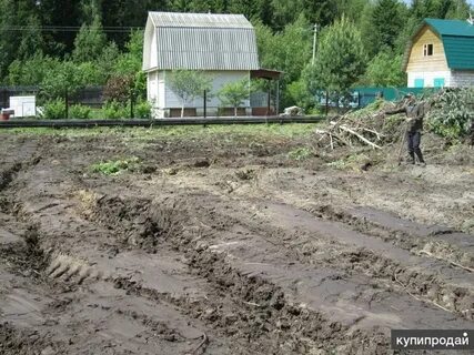 Какой землей выровнять участок