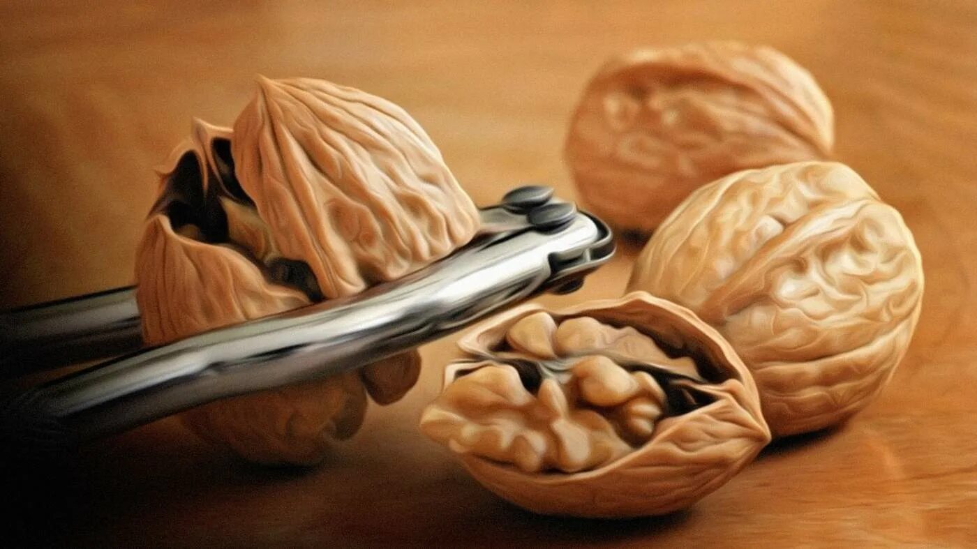 колишь орехи. приспособление для раскалывания орехов. орех грецкий. орех грецкий. грецкий орех в скорлупе.