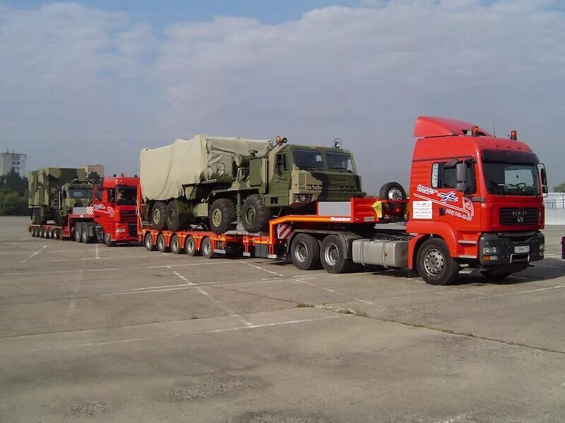 трал 20 метров. трал негабарит. низкорамный трал негабарит. негабаритные перевозки тралом. Volvo 500 негабарит.