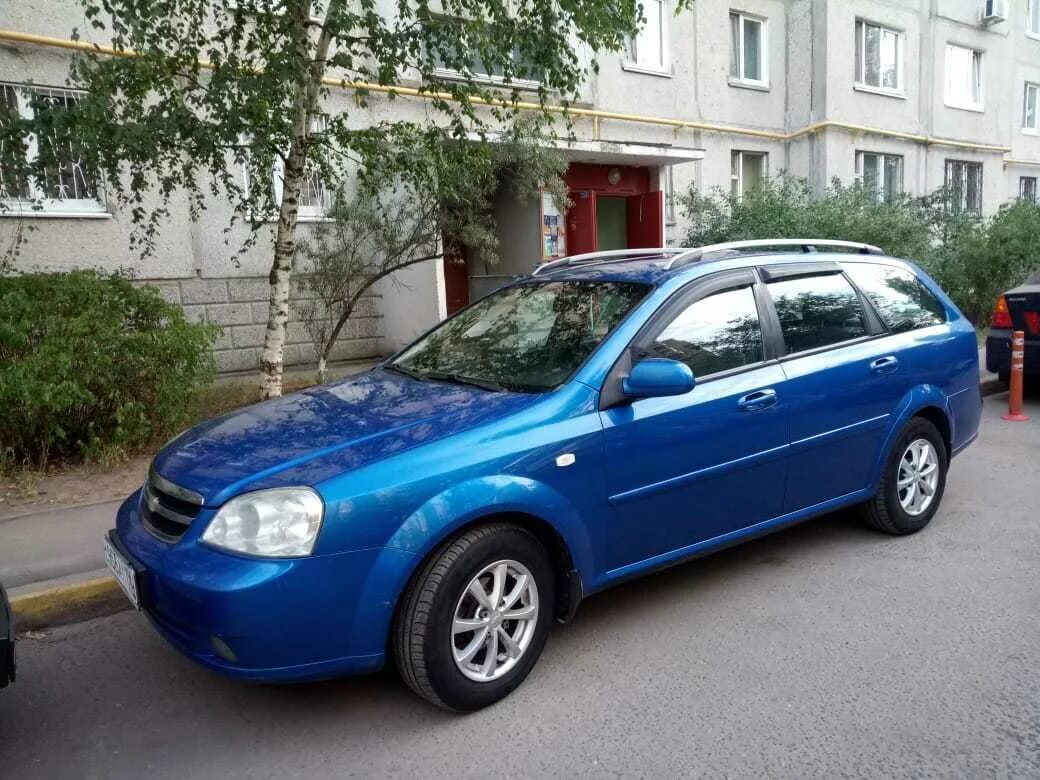 Лачетти универсал отзывы. Chevrolet Lacetti 2009 универсал. Chevrolet Lacetti Blue. Chevrolet Lacetti универсал 1.6 2009. Chevrolet Lacetti, 2010г универсал.