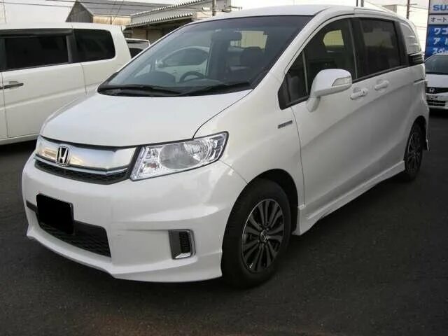 Фары фрид спайк. Хонда Спайк 2016. Honda freed Spike гибрид. Решетка Honda freed Spike. Хонда Фрид гибрид 2011г.