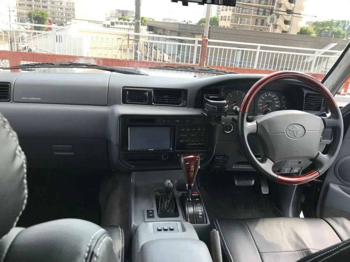 Тойота ленд Крузер 80 салон. Toyota Land Cruiser 105 2007 салон. Toyota Land Cruiser 80 салон магнитола. Торпедо ленд Крузер 80. Куплю праворульное японское