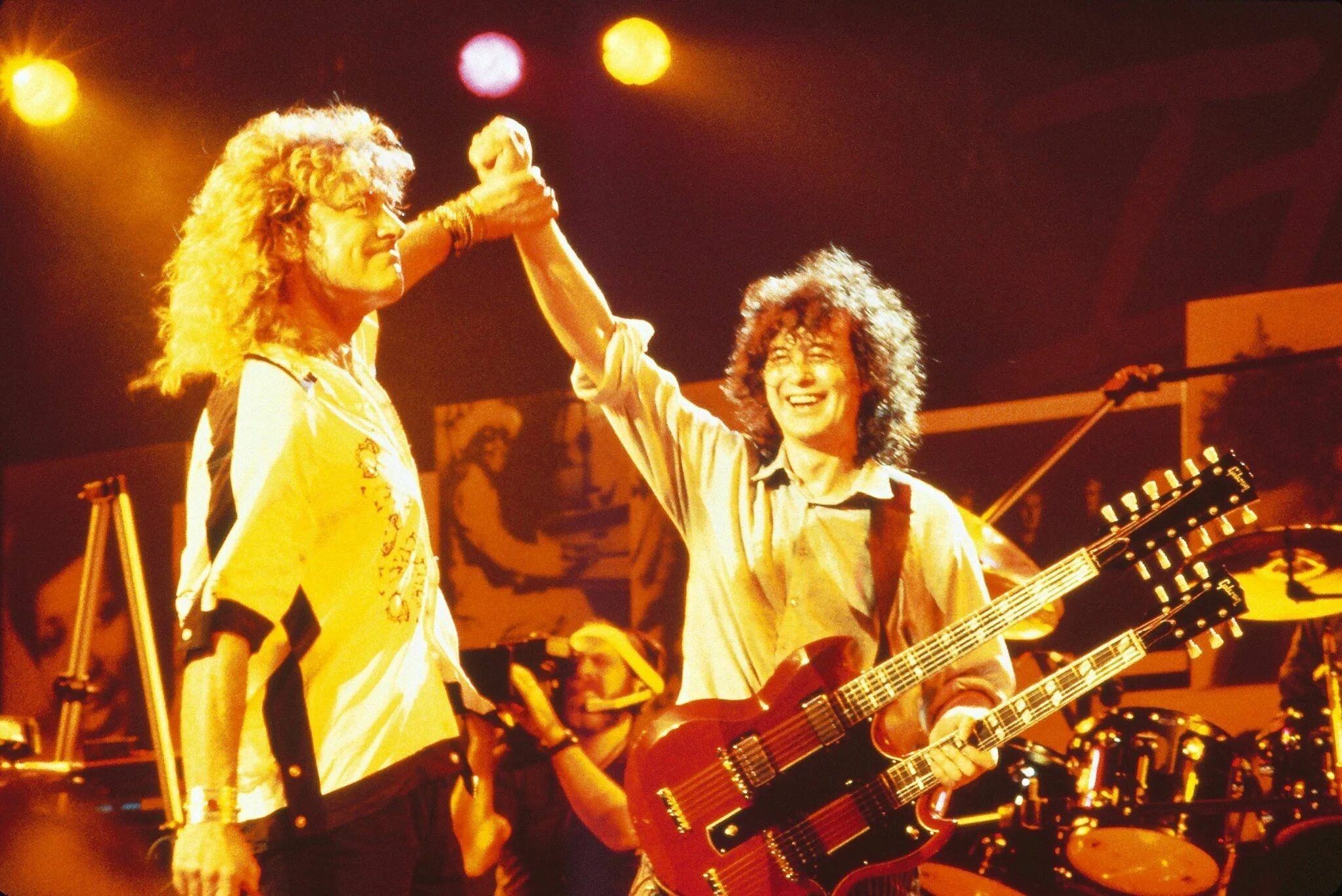 Лед зеппелин хиты. Лед зеппелин джимми пейдж. led zeppelin 1980.